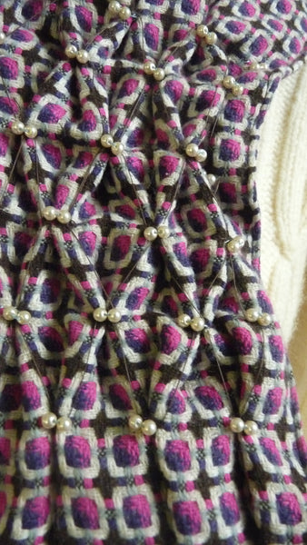 Smocked cowl in pink and brown checked wool