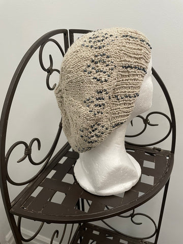 Knitted cotton and silk beanie in beige with black seed beads