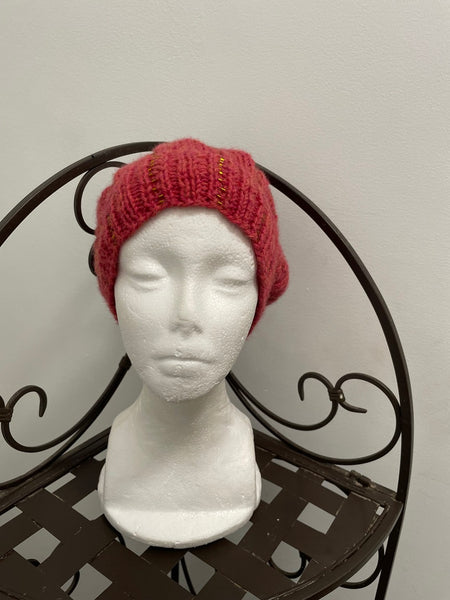 Knitted beanie in orange with gold seed beads